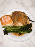 Smothered Chicken Thighs Over White Rice